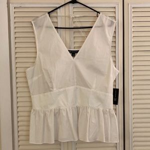 Size XL. White peplum top
